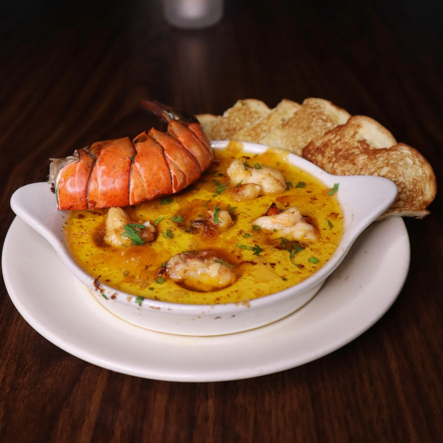 Lobster tail in saffron butter with grilled crostini, shot for Prime 88's Chef's Specials