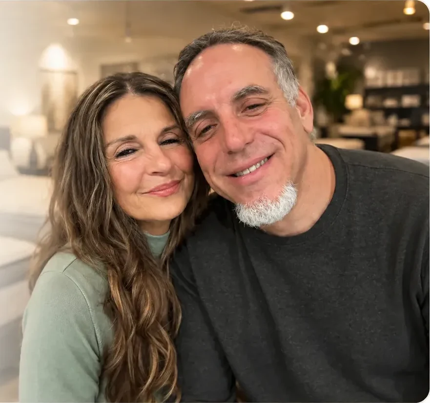 The owners of Sleep World in their Brooksville mattress showroom